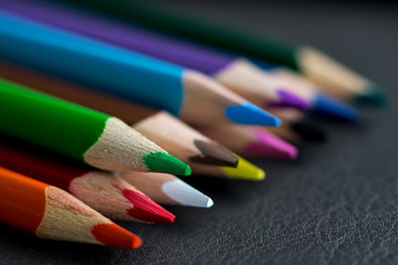 close up picture of colored pencils crayons