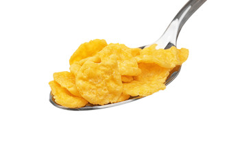 Spoon with cornflakes isolated on white
