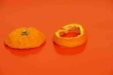 Mandarin crust is dried and isolated on a monophonic background. Zedra on the background