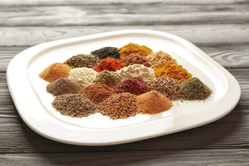 Different spices on white plate