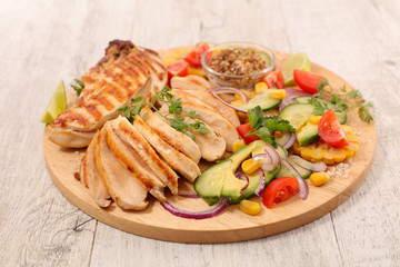 grilled chicken fillet and vegetables