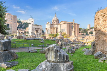 Rome, Italy. Ruins of the Roman Forum: the Arch of Septimius Severus, the Column of Phocas, the...