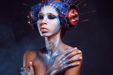 Close up Portrait of beautiful fashion woman with metal head wear