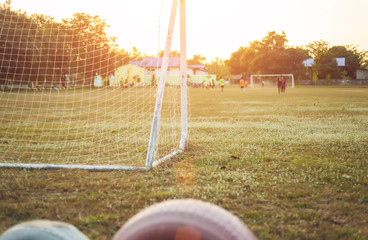 old football Vintage photography with soccer goal with lens flare effect	