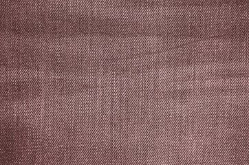 Fototapeta na wymiar Brown texture of jeans textile close up. Blank backdrop for design. Multicolor background set.