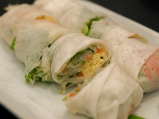 VEGETABLE SPRING ROLLS ON WHITE PLATE