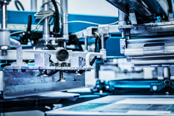 Industrial metal printing machinery.