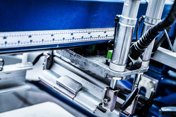 Industrial metal printing machinery.