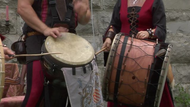 Medieval musicians during a historical reenactment festival 