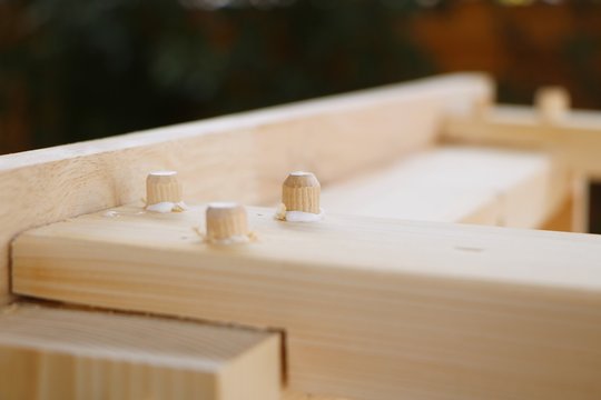 Assembling furniture, wooden dowel joint