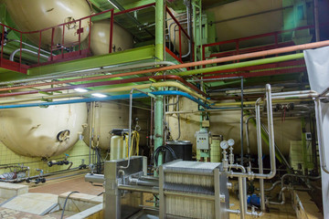 Special industrial equipment in the workshop of a factory for the production of wines and champagne