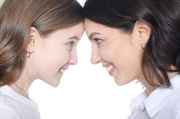 Happy mother with her daughter on a white background