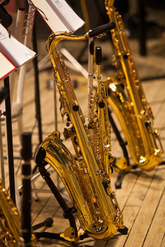  Saxophones standing on stage