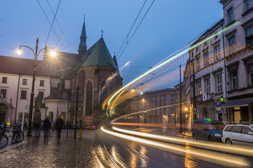 Krakow, Poland, st Francis church and tram light trails