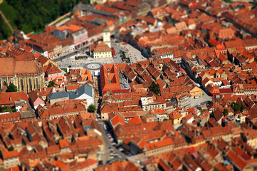 Aerial view of Brasov city in Romania. Tilt shift lens effect