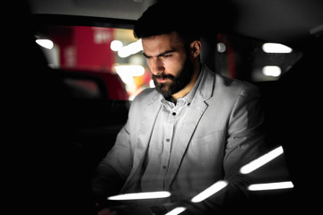 Business concept working on laptop angry man work late job.