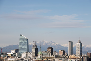 Fototapeta na wymiar View of the Milan City Skyline and the Italian Alps from the Duomo