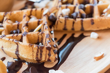 delicious sweet dessert : homemade waffle with chocolate sauce