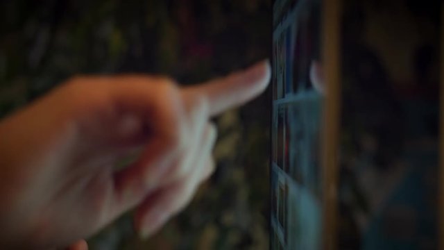 4k Device Close-up of Finger Scrolling Touch Screen