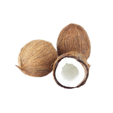 Whole and a half of coconuts isolated on white