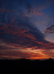 Fototapeta premium Panoramic view of the sky with clouds before dawn.