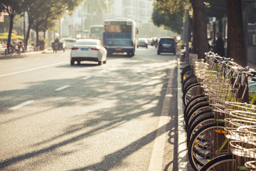 Public and private bicycles at bicycle parking spot; city of Shenzhen, People's republic of China