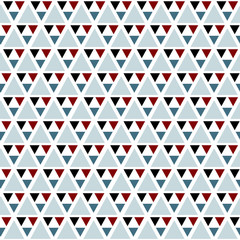 Seamless vector triangle pattern in trendy colors - blue, black, red, white.