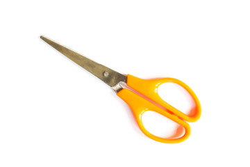 close-up of orange scissors on white background