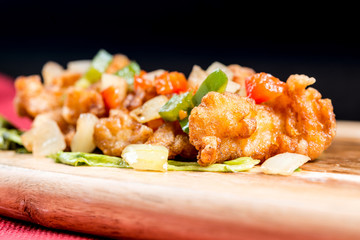 wok fried chicken stir fry with sweet peppers and chinese vegetables