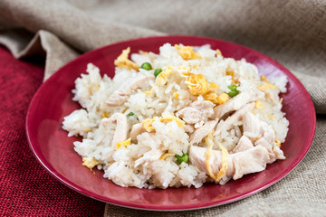 Homemade Chinese fried rice with vegetables and fried eggs