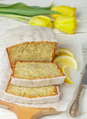Homemade lemon cake with poppy seeds and sugar glaze. Selective focus