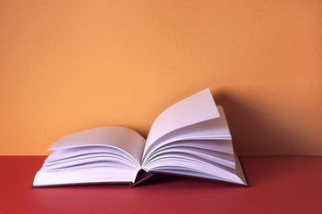 Open book on light table. Back to school. Copy space.