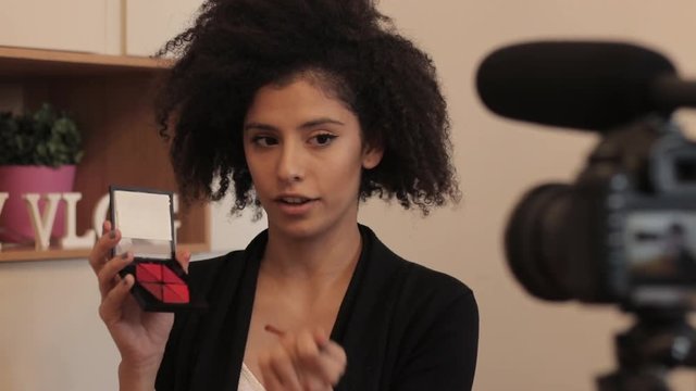 Fashion vlogger record makeup video eplainer