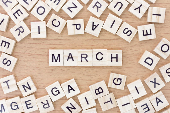 March  words with wooden blocks
