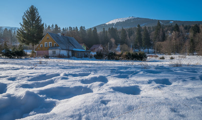 Old house in winter town