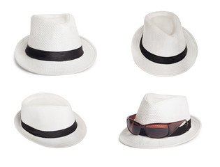 Sunglasses and a white summer hat on an isolated background