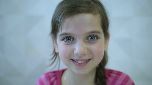 Girl shows emotions face and hand