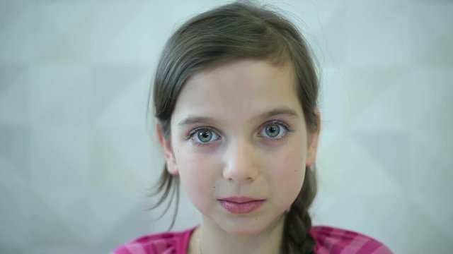 Girl shows emotions face and hand
