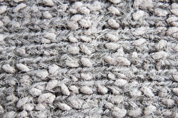 Gray knitted surface with pattern