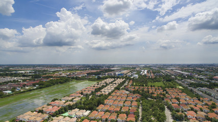 aerial view of home and house in village of land development outskirt of bangkok thailand on cloudy day