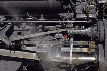 Piston rods and workings of a vinatge steam locomotive 