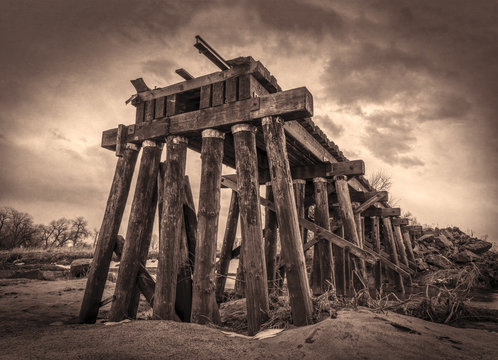 destroyed railroad timber trestle