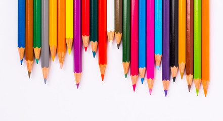 Colored pencils pattern isolated on white background