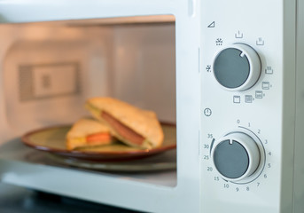 Blur Ham cheese sandwiches in the microwave