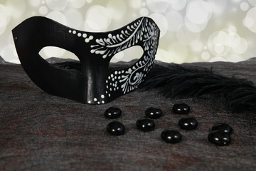 carnival mask with glittering background