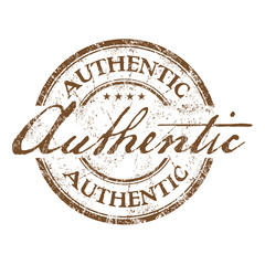 Brown grunge rubber stamp with the word authentic written with handwritten letters
