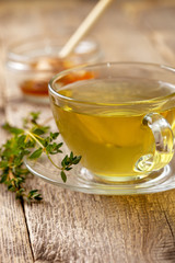 thyme tea in glass cup