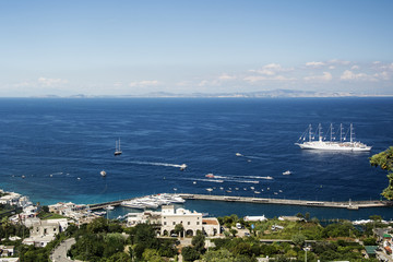 Fototapeta na wymiar Italian coast from Capri, sea and some boats and ships