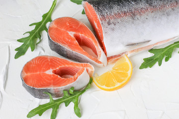 red fish with lemon and arugula