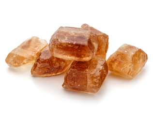 Brown caramelized lump cane sugar cube isolated on white background cutout